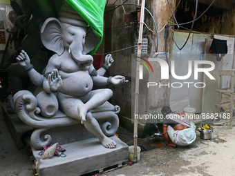 An idol of Hindu elephant-headed deity Ganesh semi-finished on the eve of the Hindu festival 'Ganesh Chaturthi' inside the artisan's village...