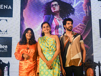 Bollywood actress Taapsee Pannu (centre), co-actor Pavail Gulati (right) and producer Ektaa R Kapoor (left) pose for photographs during a pr...