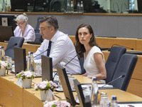 Sanna Marin Prime minister of Finland as seen sittting next to Andrej Plenković prime minister of Croatia at the European Council Round Tabl...