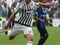 Juventus midfielder Simone Padoin (20) in action during the Serie A football match n.9 JUVENTUS - ATALANTA on 25/10/15 at the Juventus Stadi...