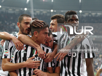 Juventus forward Paulo Dybala (21) celebrates with his teammates after scoring his goal during the Serie A football match n.9 JUVENTUS - ATA...
