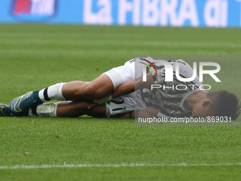 Juventus forward Paulo Dybala (21) lies on the pitch injured during the Serie A football match n.9 JUVENTUS - ATALANTA on 25/10/15 at the Ju...
