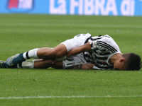 Juventus forward Paulo Dybala (21) lies on the pitch injured during the Serie A football match n.9 JUVENTUS - ATALANTA on 25/10/15 at the Ju...