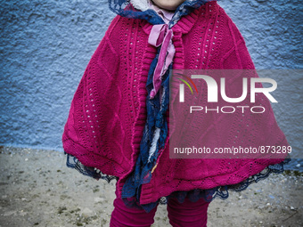 A migrant girl in a camp in Kos, Greece, on October 27, 2015. More than 700,000 refugees and migrants have reached Europe's Mediterranean sh...