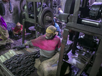 Climate migrant people work unhealthy and risky environment in a Door Locker making factory factory at Dhaka, Bangladesh on August 30, 2022....
