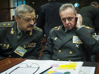 Ukrainian Major Gen Leonid Holopatiuk (L)  and Viktor Muzhenko, Commander-in-Chief of the Armed Forces of Ukraine (R)  prior to the meeting...