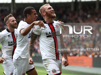 Sheffield United's Oliver McBurnie celebrates after scoring their first goal during the Sky Bet Championship match between Hull City and She...