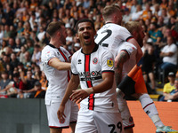 Sheffield United's Iliman Ndiaye celebrates after Oliver McBurnie scored their first goal during the Sky Bet Championship match between Hull...