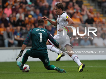 Sander Berge of Sheffield United in action with Matt Ingram of Hull City during the Sky Bet Championship match between Hull City and Sheffie...