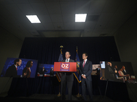 Dr. Mehmet Oz, Republican candidate for the Pennsylvania U.S. Senate, sided by U.S. Senator Pat Toomey (R-PA) holds a press conference on TV...