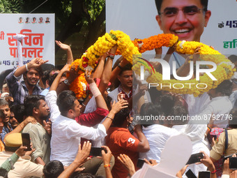 Senior Congress leader and former Rajasthan deputy chief minister Sachin Pilot being garlanded by supporters during his 45th birthday celebr...