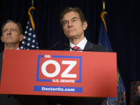 Dr. Mehmet Oz, Republican candidate for the Pennsylvania U.S. Senate, sided by U.S. Senator Pat Toomey (R-PA) holds a press conference on TV...