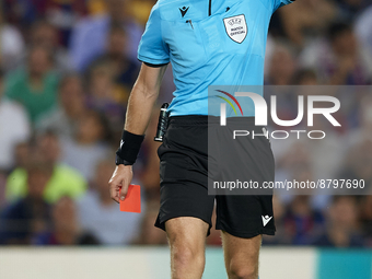 Referee Lawrence Visser during the UEFA Champions League group C match between FC Barcelona and Viktoria Plzen at Spotify Camp Nou on Septem...