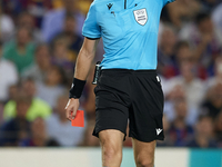 Referee Lawrence Visser during the UEFA Champions League group C match between FC Barcelona and Viktoria Plzen at Spotify Camp Nou on Septem...