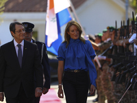 Cyprus' president Nicos Anastasiades, left, and the President of the European Parliament, Ms Roberta Metsola review a military guard of hono...