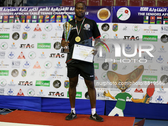 Quadri Aruna poses for photos after winning the men's singles final match between Quadri Aruna of Nigeria and Omar Assar of Egypt at the 202...