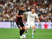Christopher Nkunku and Luka Modric during UEFA Champions League match between Real Madrid and RB Leipzig at Estadio Santiago Bernabeu on Sep...