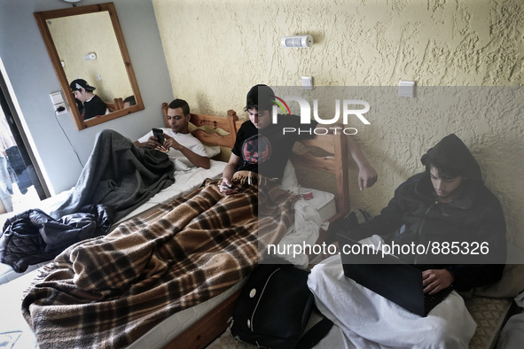 Syrians men in a Hotel in Kos, on November 1, 2015. Many Syrians living around the Island of Kos Greece in hotels as the tourist season ends...