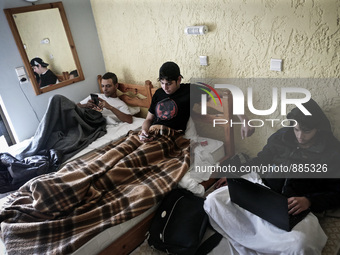 Syrians men in a Hotel in Kos, on November 1, 2015. Many Syrians living around the Island of Kos Greece in hotels as the tourist season ends...