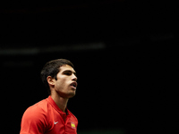 Carlos Alcaraz of Spain looks on as he plays against Soonwoo Kwon of Republic of Korea during the Davis Cup Finals Group B Stage Men's Singl...