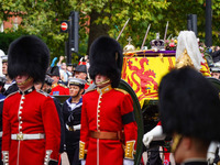  Hundreds of thousands attended the Queen's state funeral in London, on September 19, 2022, to farewell Queen Elizabeth II as her coffin tra...
