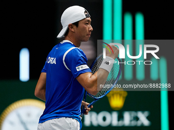 Seong Chan Hong of Republic of Korea celebrates against Roberto Bautista Agut of Spain during the Davis Cup Finals Group B Stage Men's Singl...