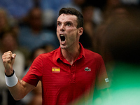Roberto Bautista Agut of Spain celebrates against Seong Chan Hong of Republic of Korea during the Davis Cup Finals Group B Stage Men's Singl...