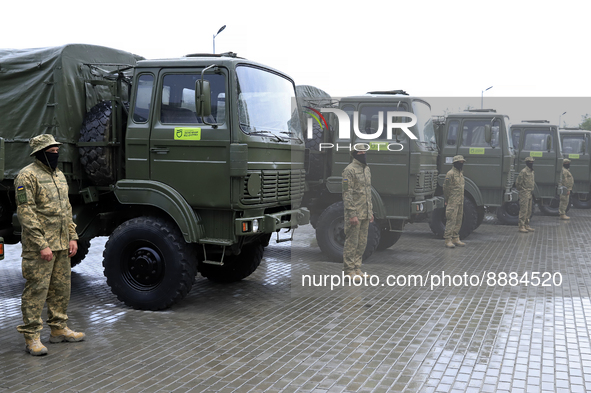 DNIPRO, UKRAINE - SEPTEMBER 20, 2022 - Ukrainian servicemen stand by heavy-duty trucks that were purchased at the expense of the city budget...