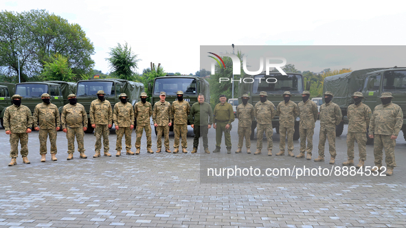 DNIPRO, UKRAINE - SEPTEMBER 20, 2022 - Dnipro city head Borys Filatov (C) poses for a photo with Ukrainian servicemen during the ceremony to...