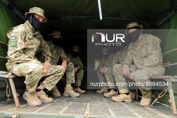 DNIPRO, UKRAINE - SEPTEMBER 20, 2022 - Ukrainian servicemen sit inside one of the heavy-duty trucks that were purchased at the expense of th...
