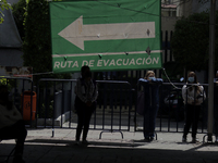 Signage of an evacuation route in the Iztapalapa municipality, Mexico City. (