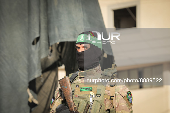 Members of the Izz al-Din al-Qassam Brigades, the military wing of the Islamic movement Hamas take part in inauguration ceremony of the 