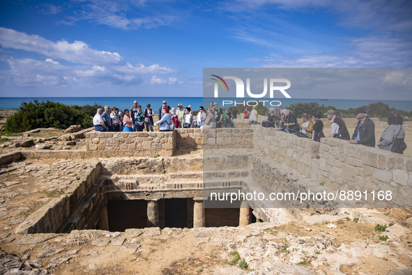 Tourists visit the Archeologic site of the Tombs of the Kings in Paphos, Cyprus on March 5, 2022. 