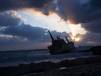 The shipwreckof the vessel Edro III at sunset on Cyprus on March 3, 2022. (