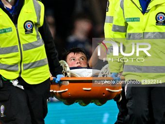 Scotland's Nathan Patterson goes off injured during the UEFA Nations League match between Scotland and Ukraine at Hampden Park, Glasgow,...