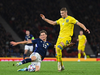 Scotland's Jack Hendry tackles Ukraine's Artem Dovbyk during the UEFA Nations League match between Scotland and Ukraine at Hampden P...