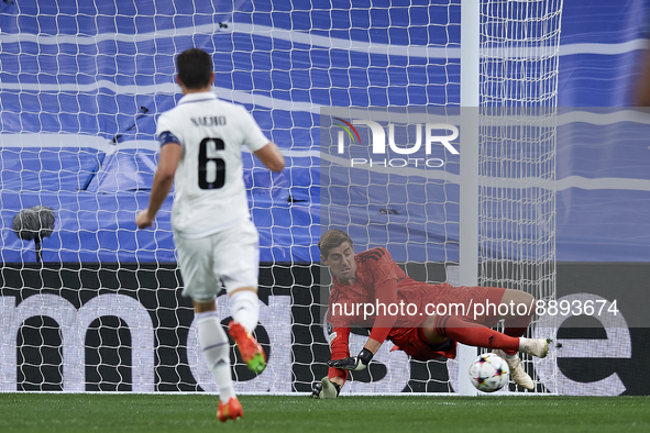 Thibaut Courtois goalkeeper of Real Madrid and Belgium makes a save during the UEFA Champions League group F match between Real Madrid and R...