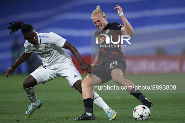 Xaver Schlager central midfield of RB Leipzig and Austria and Eduardo Camavinga central midfield of Real Madrid and France compete for the b...
