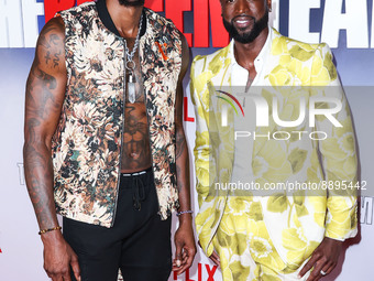 American professional basketball player Dwight Howard and American former professional basketball player Dwyane Wade wearing Gucci arrive at...
