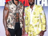 American professional basketball player Dwight Howard and American former professional basketball player Dwyane Wade wearing Gucci arrive at...