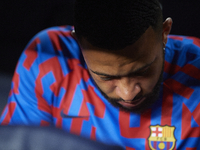 Memphis Depay centre-forward of Barcelona and Netherlands sitting on the bench prior the UEFA Champions League group C match between FC Barc...