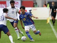 Kaoru Mitoma left winger of Japan and Brighton & Hove Albion runs with the ball during the international friendly match between Japan and Un...