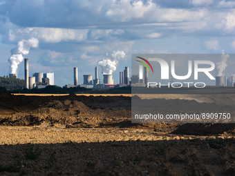 general view of steam rising from cooling towers at Neurath and Niederaussem RWE coal-fired power plants in Juenchen, Germany on September 2...