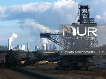 general view of a bucket wheel excavator at the Garzweiler open coal mind in Juenchen, as from the background of steam rising from cooling t...