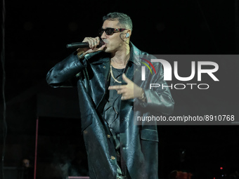 The Italian rappers Fabio Bartolo Rizzo as know with Marracash pseudonym sings on a stage for his Persone Tour at Arena di Verona in Verona,...