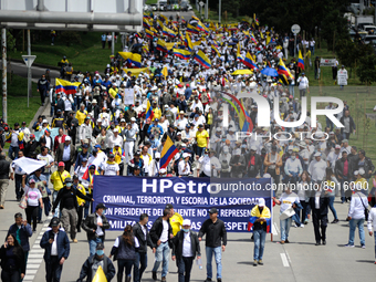 Demonstrators take the streets with Colombian flags during the first antigovernment protest against left-wing president Gustavo Petro and hi...
