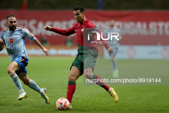 Cristiano Ronaldo of Portugal (R ) vies with Dani Carvajal of Spain during the UEFA Nations League Group A2 football match between Portugal...