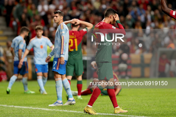 Cristiano Ronaldo of Portugal (R ) reacts during the UEFA Nations League Group A2 football match between Portugal and Spain, at the Municipa...