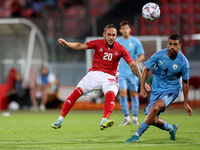 


Jodie Jones (L) of Malta shoots at goal during the friendly international soccer match between Malta and Israel at the National Stadium,...