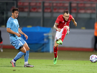 


Ryan Camenzuli (R) of Malta shoots at gaol during the friendly international soccer match between Malta and Israel at the National Stadiu...